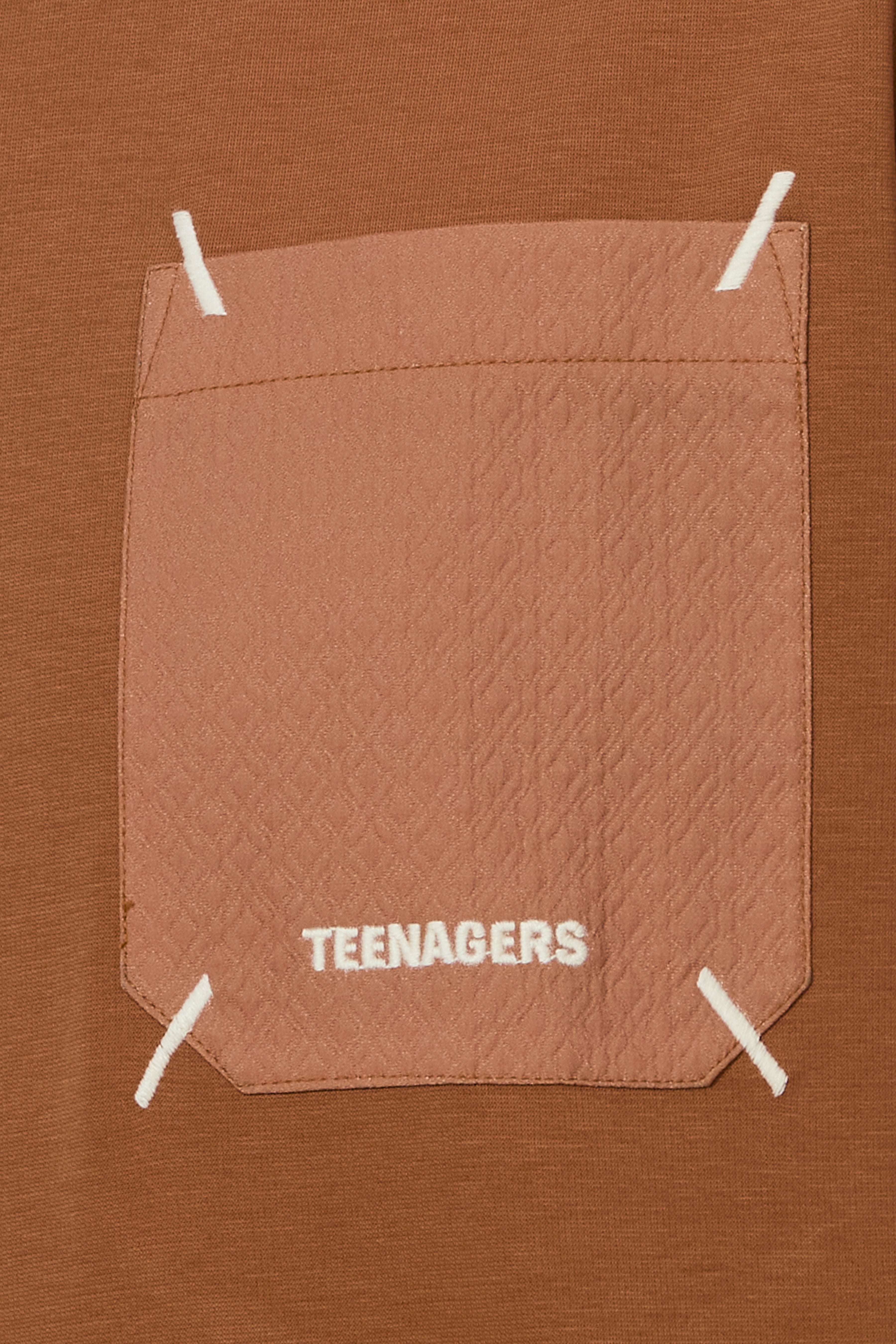 Minimalist Rust Cotton Tee with Pocket Design
