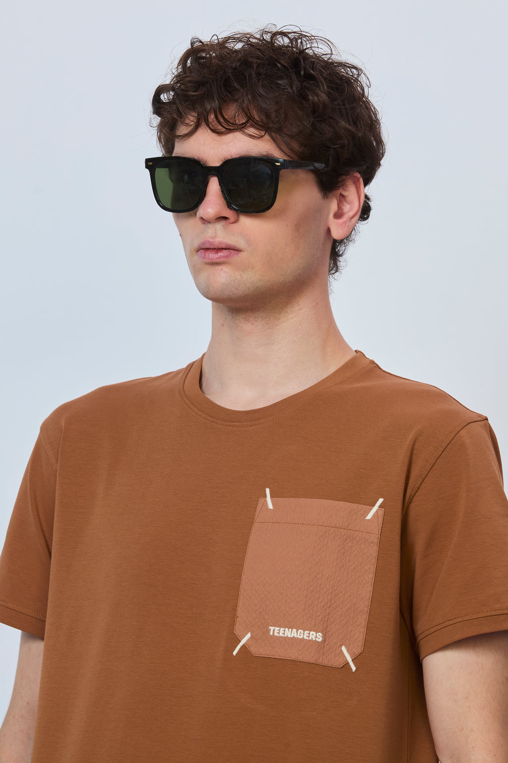 Minimalist Rust Cotton Tee with Pocket Design