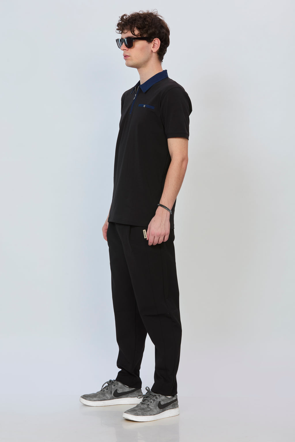Black Statement Polo with Denim Trim & Functional Zipper
