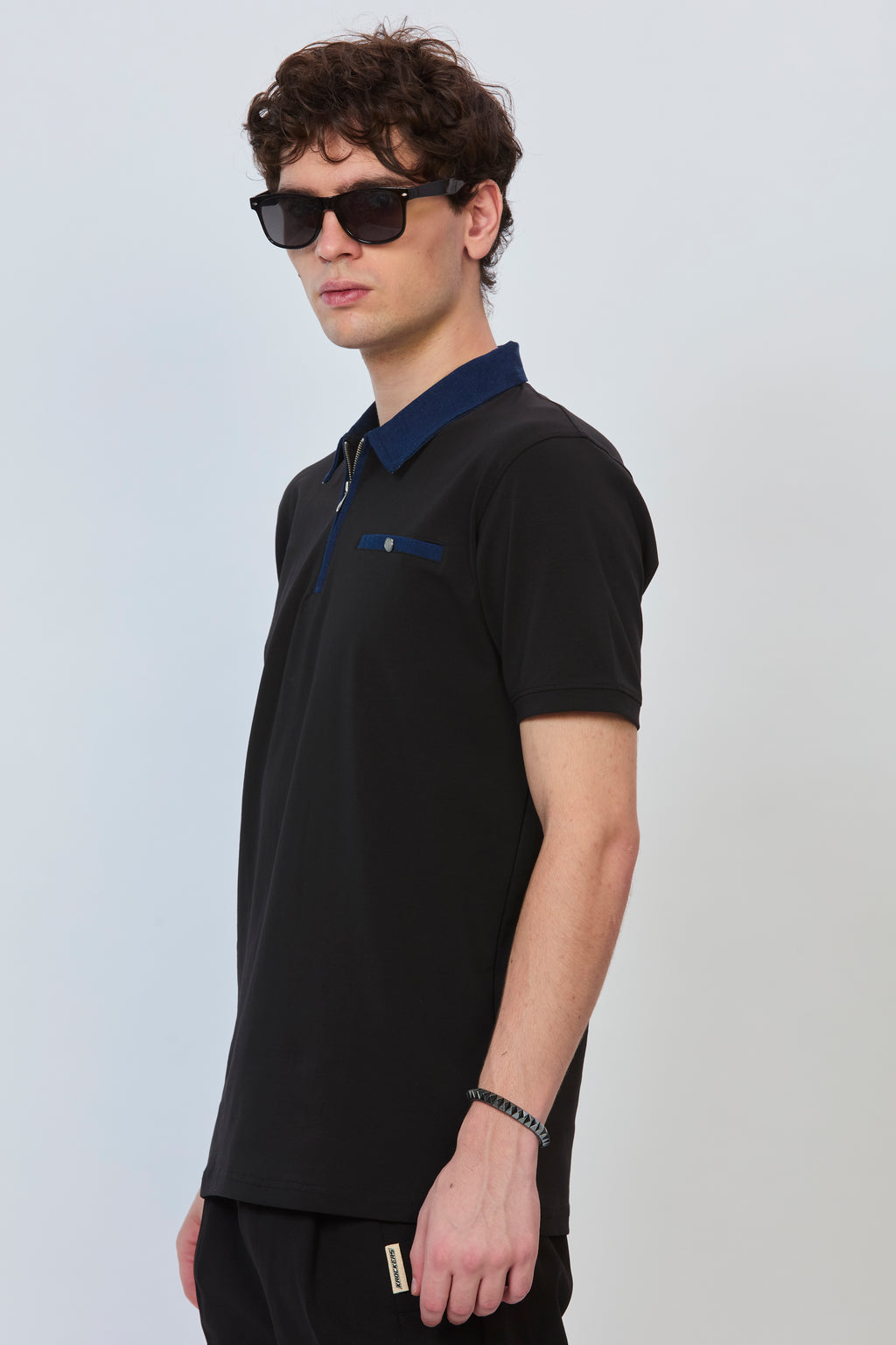 Black Statement Polo with Denim Trim & Functional Zipper
