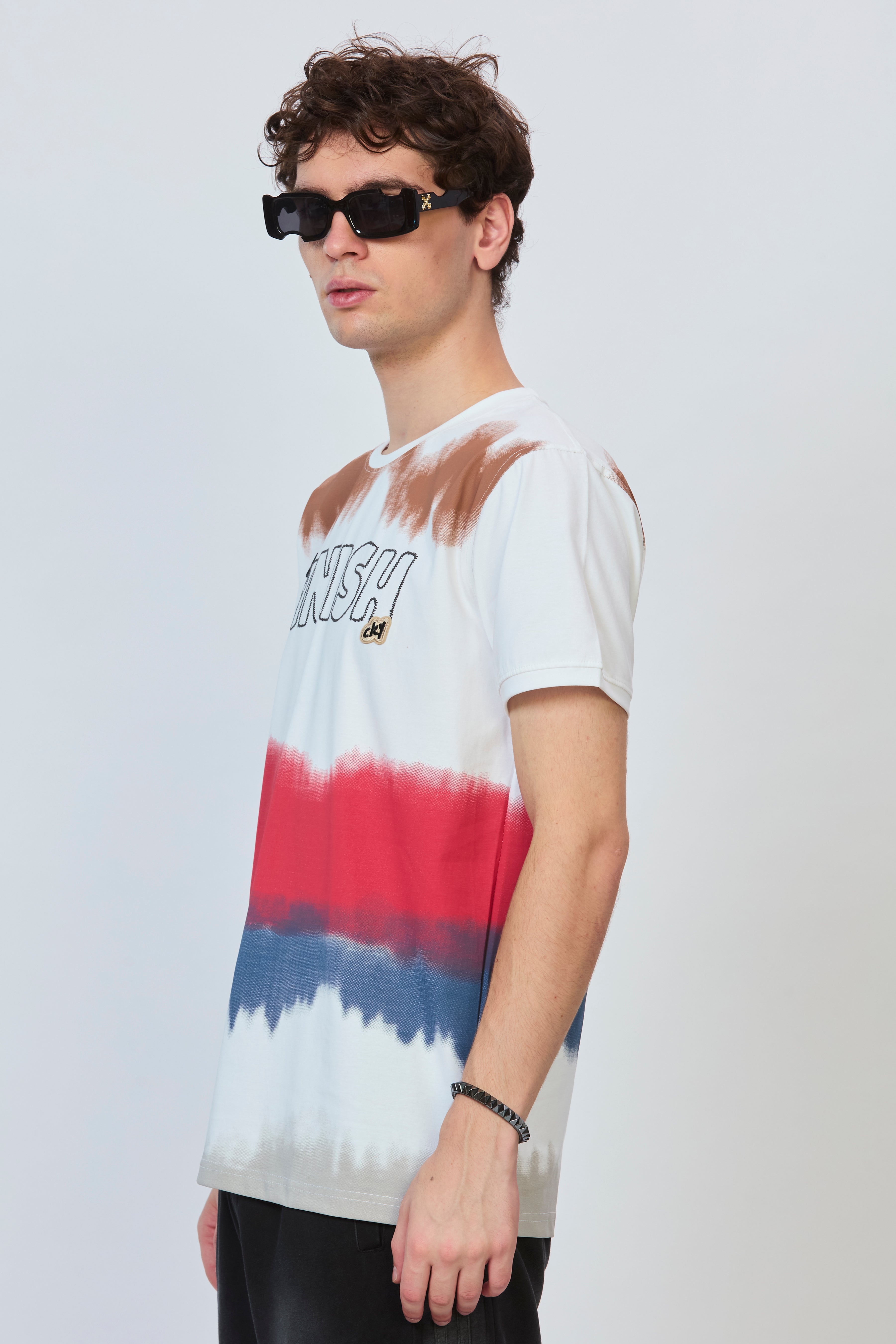 White Canvas Tee Featuring Bold Prints & Premium Embroidery
